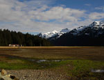Cabin with snowy mountains